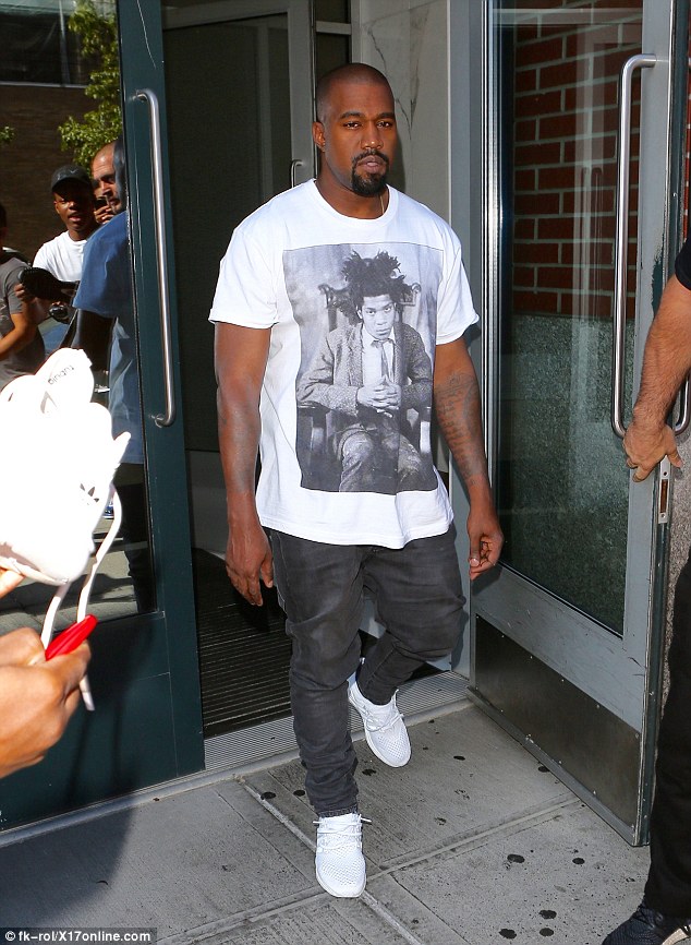 Spotted: Kanye West in Supreme Tee and Adidas Flux Sneakers
