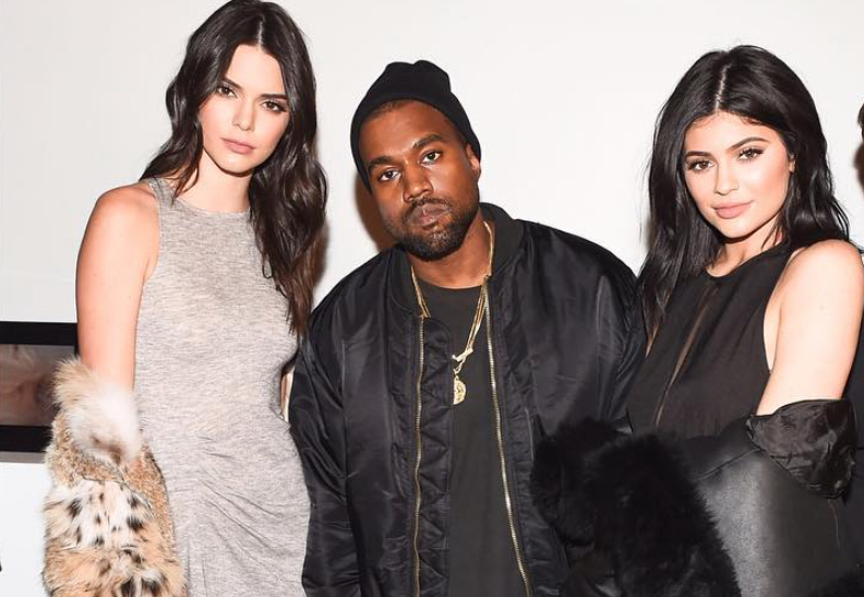 Kanye West With Kylie & Kendall Wears Alpha Industries Jacket, Maison Margiela Pants And New Yeezy Boost Sneakers