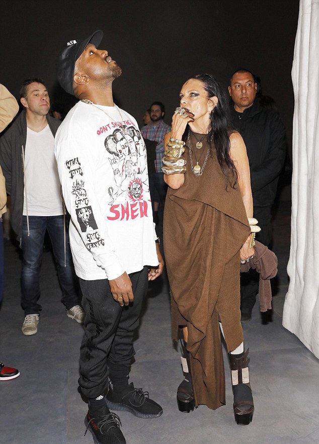 Kanye West At Rick Owens Exhibition In Yeezy Sweatpants and Sneakers