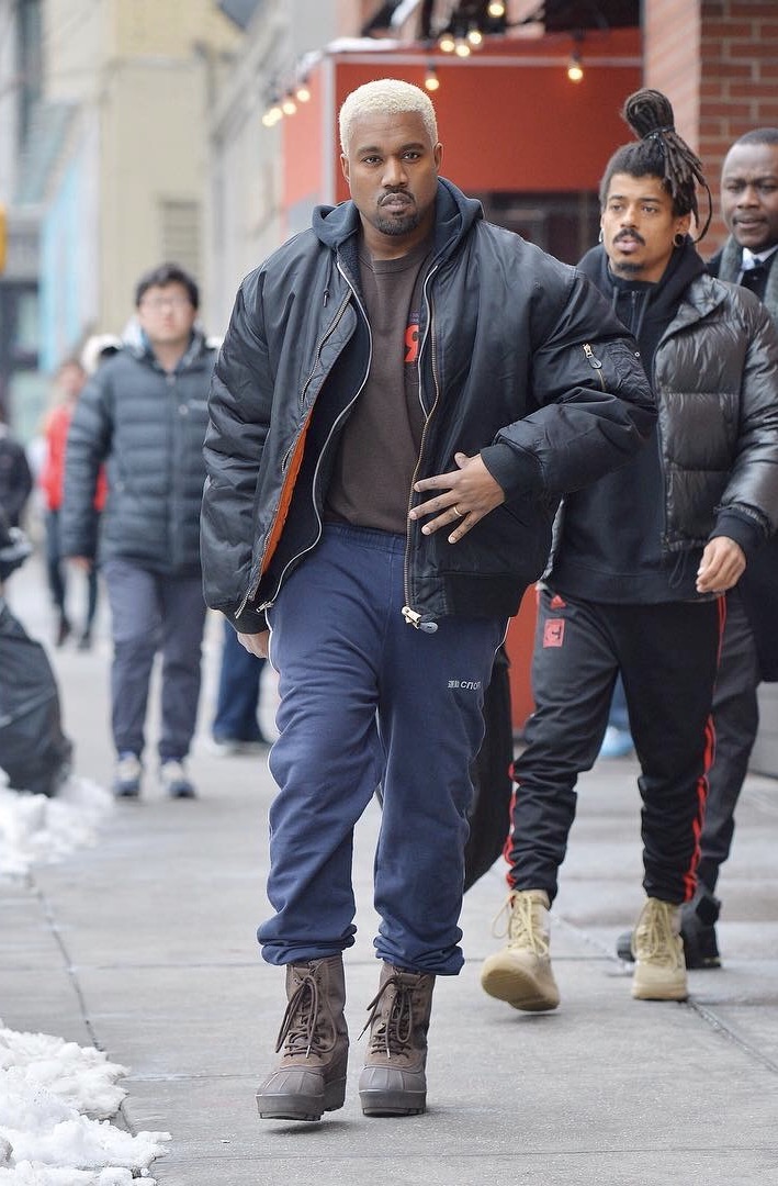 SPOTTED: Kanye West In Gosha Rubchinskiy Sweatpants, Raf Simons Jacket and Yeezy 950 Boots