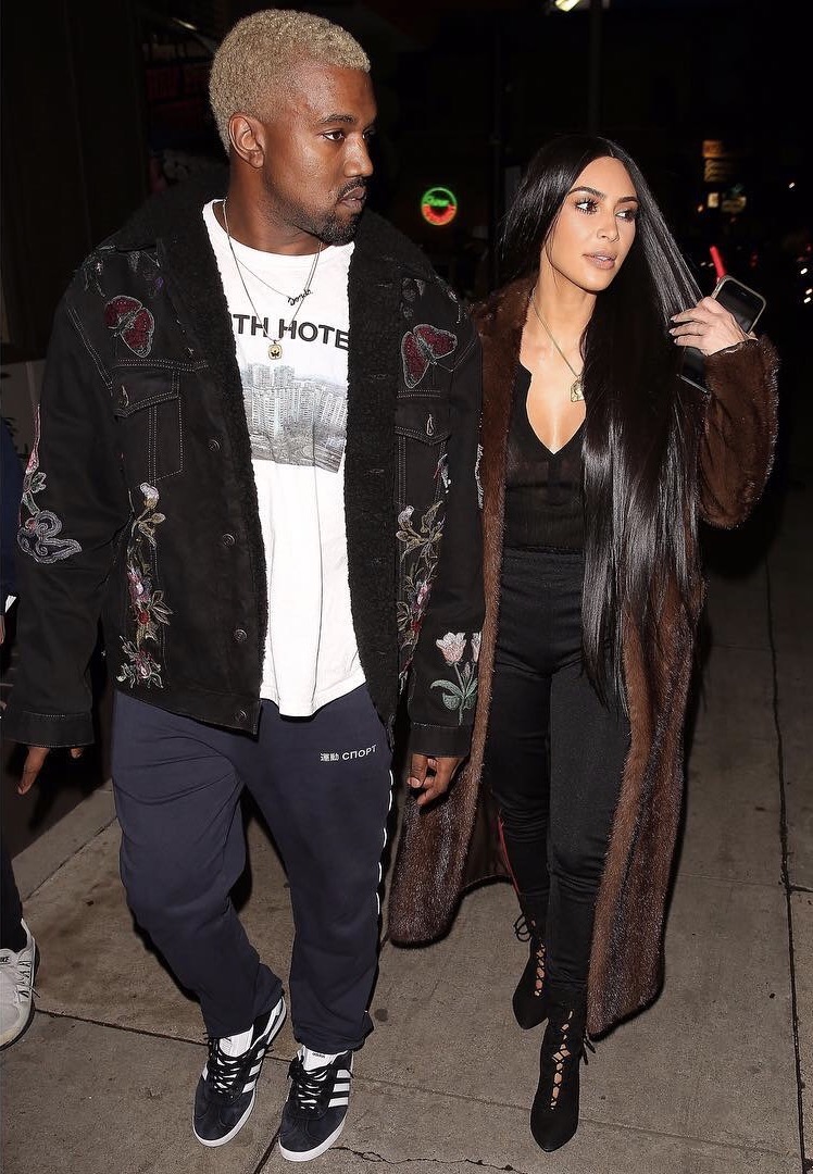 SPOTTED: Kanye In Yeezy Boost Sneakers And Gucci Jacket