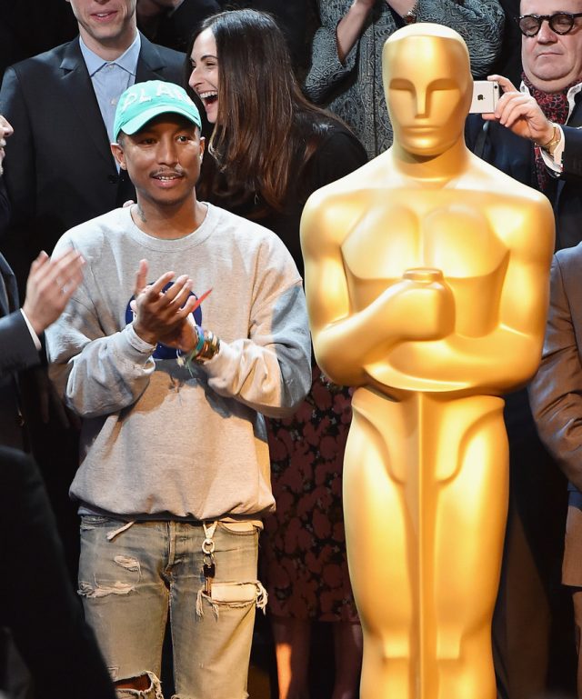 SPOTTED: Pharrell Williams in C.P.F.M Cap, NASA Jumper, G-Star Raw Jeans and Timberlands at Oscar Luncheon