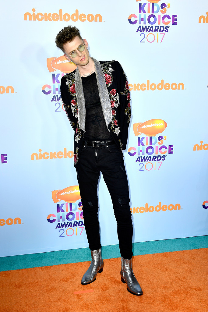 SPOTTED: Machine Gun Kelly At The Kid’s Choice Awards In Roberto Cavalli Jacket And Saint Laurent Boots