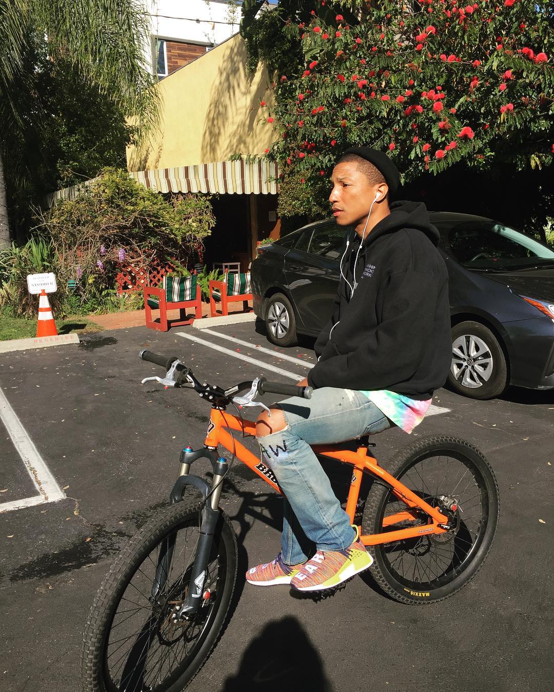 SPOTTED: Pharrell Williams Rides Brooklyn Machine Works Bike In Adidas NMD Body And Earth Sneakers