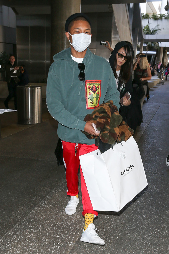SPOTTED: Pharrell Williams In Bedwin And The Heartbreakers Camo Coat And Adidas Pants And Sneakers