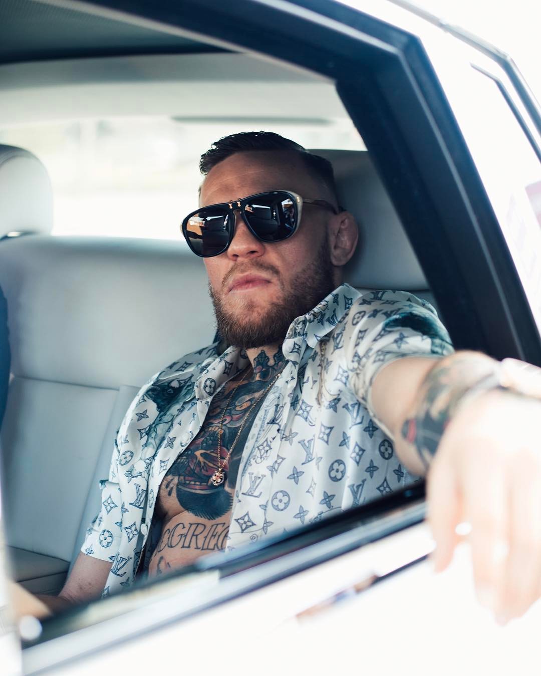SPOTTED: Two Looks From Conor McGregor – Louis Vuitton Shirt And Saint Laurent Sneakers