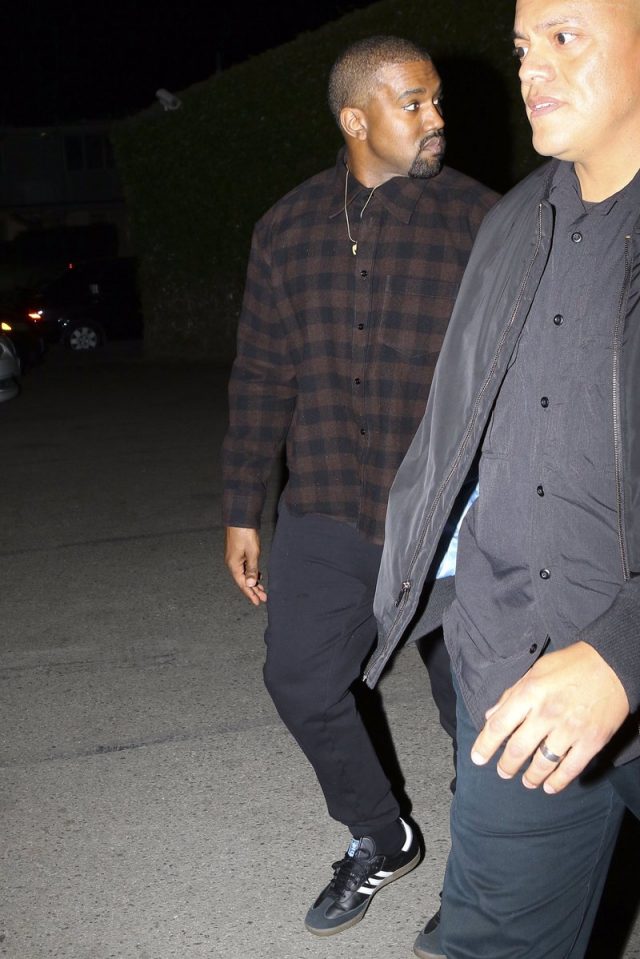 SPOTTED: Kanye West In Balenciaga Flannel Shirt and Adidas Samba Sneakers