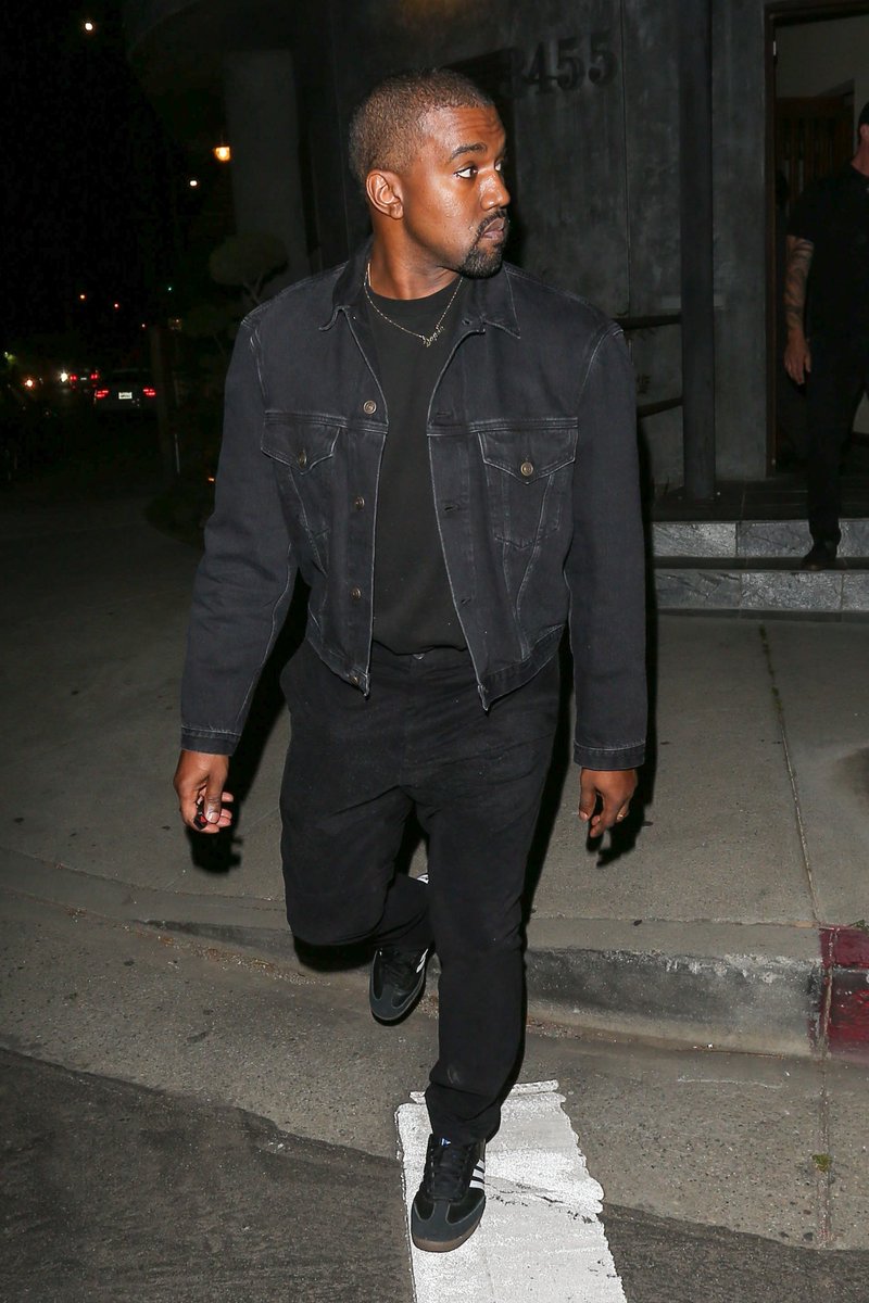 SPOTTED: Kanye West In Balenciaga Jacket And Adidas Sneakers