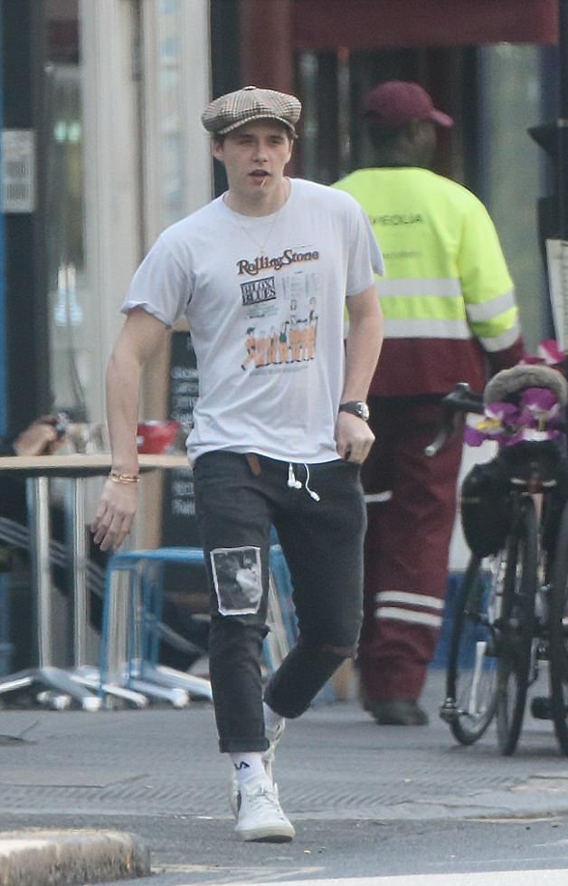 SPOTTED: Brooklyn Beckham in Pull And Bear Jeans and Saint Laurent Sneakers