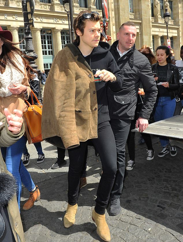 SPOTTED: Harry Styles in a Saint Laurent Shearling Coat, Boots and a Gucci Hoodie