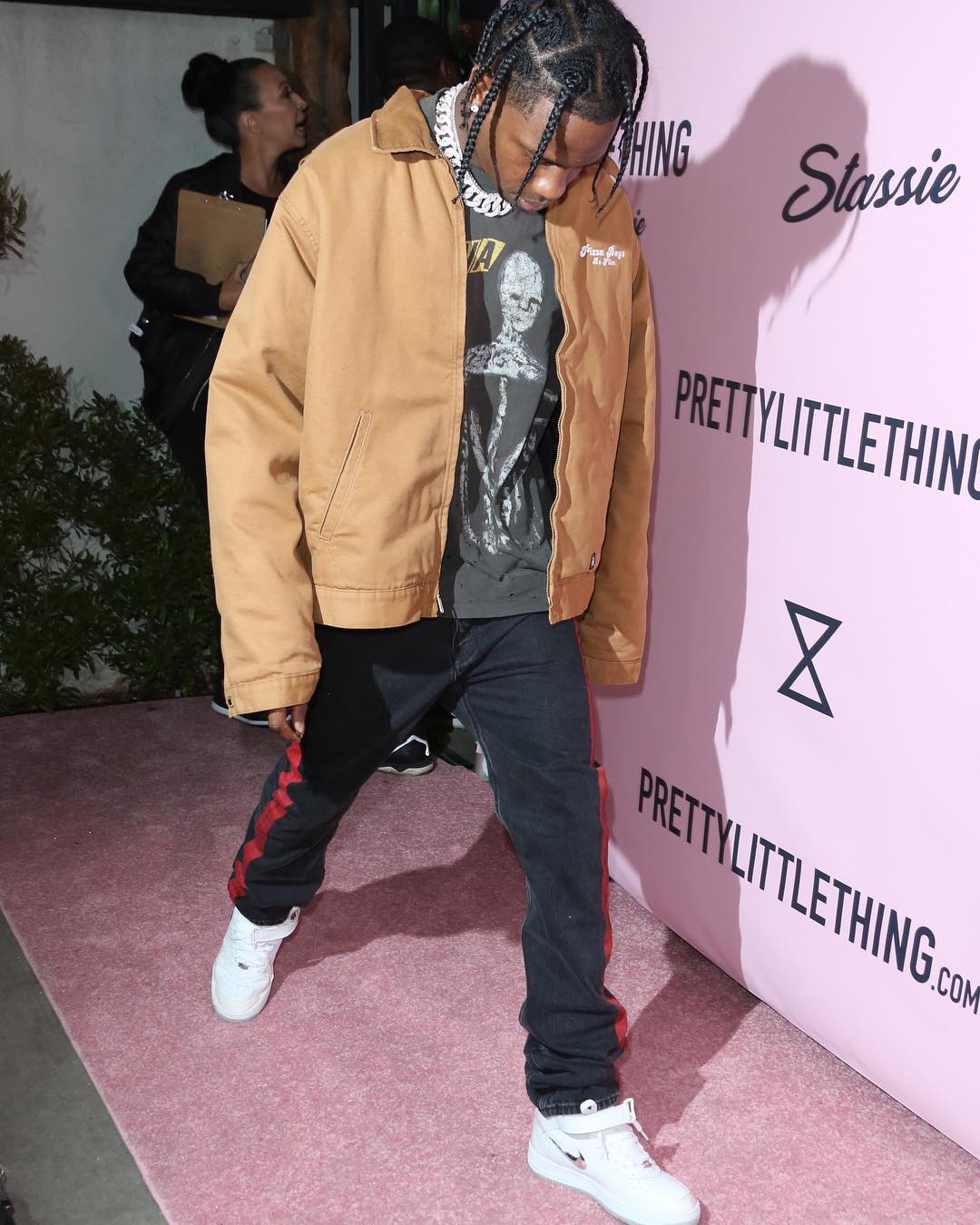 SPOTTED: Travis Scott in Pizza Boys Jacket, Balenciaga Jeans and Nike Sneakers