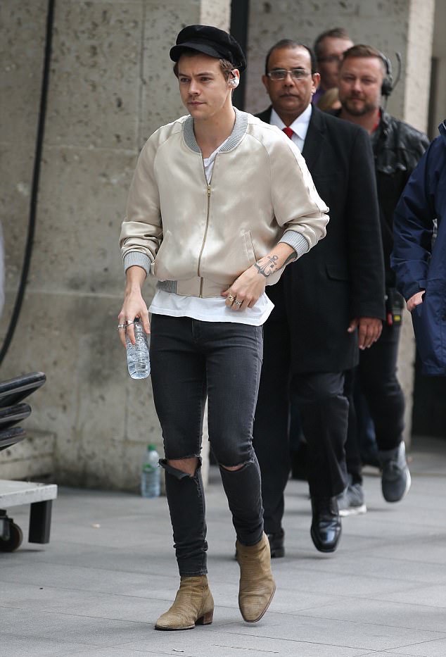 SPOTTED: Harry Styles In Harry Lambert Jacket And Saint Laurent Jeans And Boots