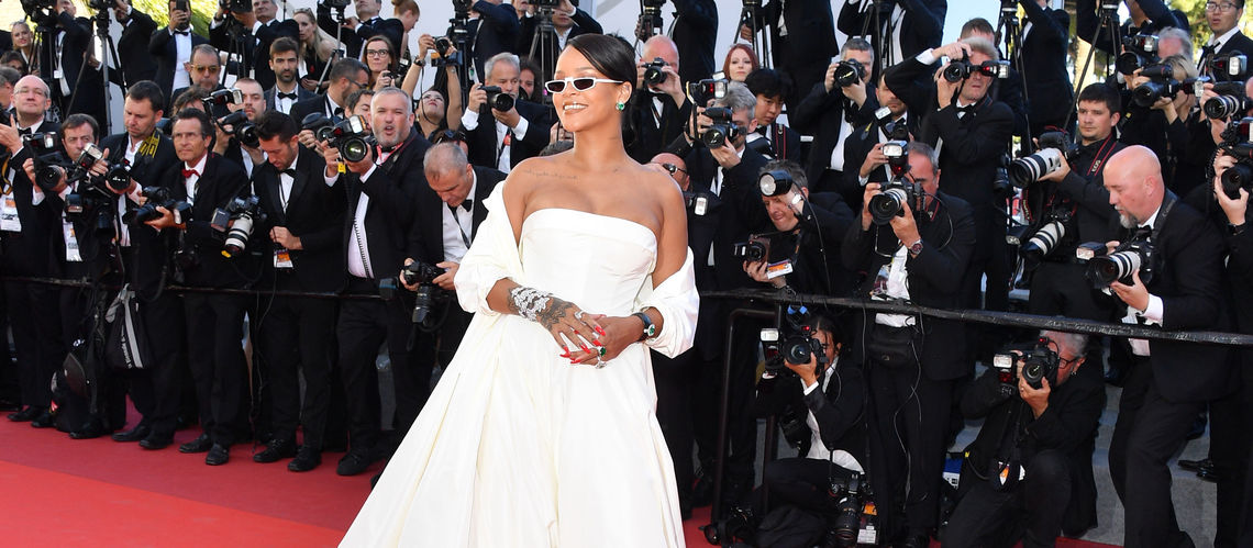SPOTTED: Rihanna In Oversized Trenchcoat And Tony Montana T-Shirt