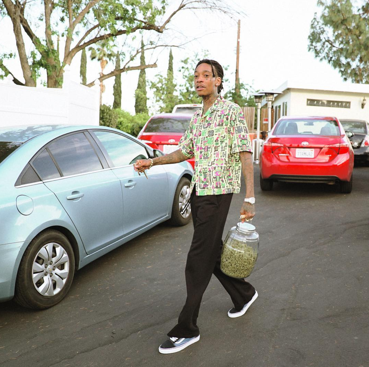 SPOTTED: Wiz Khalifa In Green Shirt And Old Skool Vans