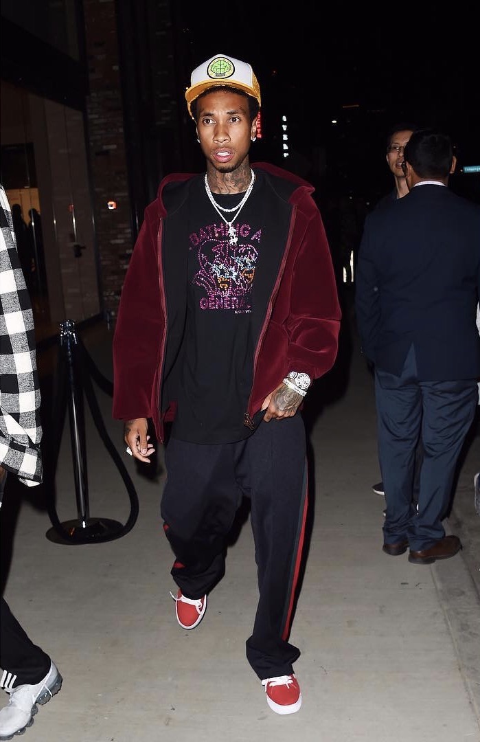 SPOTTED: Tyga In NERD Neptunes Hat, Bape T-Shirt and Gucci Trousers