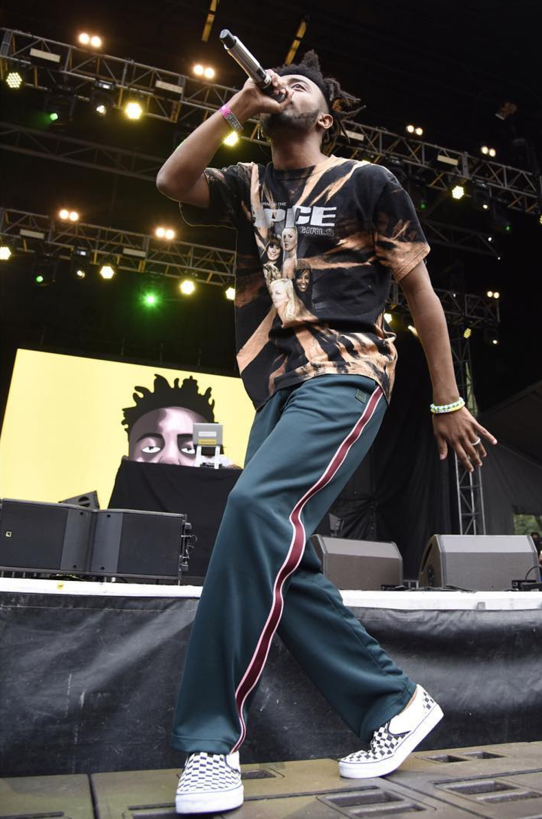 SPOTTED: Aminé at Lollapalooza In Spice Girls T-Shirt And Vans Sneakers