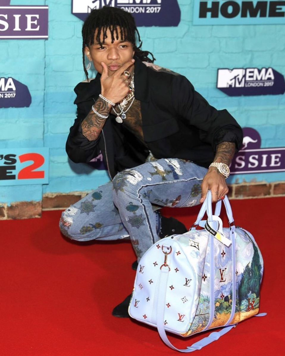 SPOTTED: Swae Lee Flexes at the MTV EMAs With LV x Jeff Koons Bag