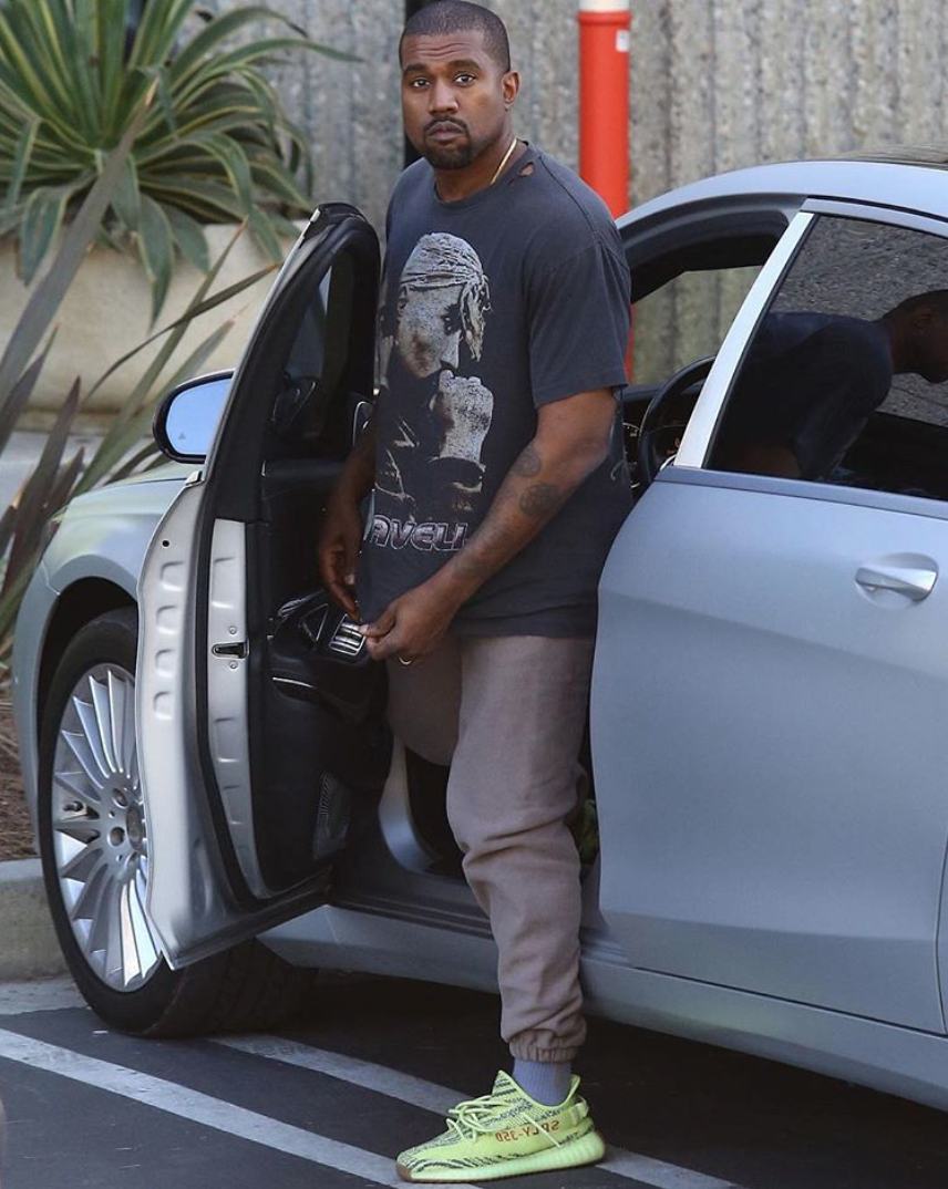 SPOTTED: Kanye West in Frozen Yellow Zebra Yeezys