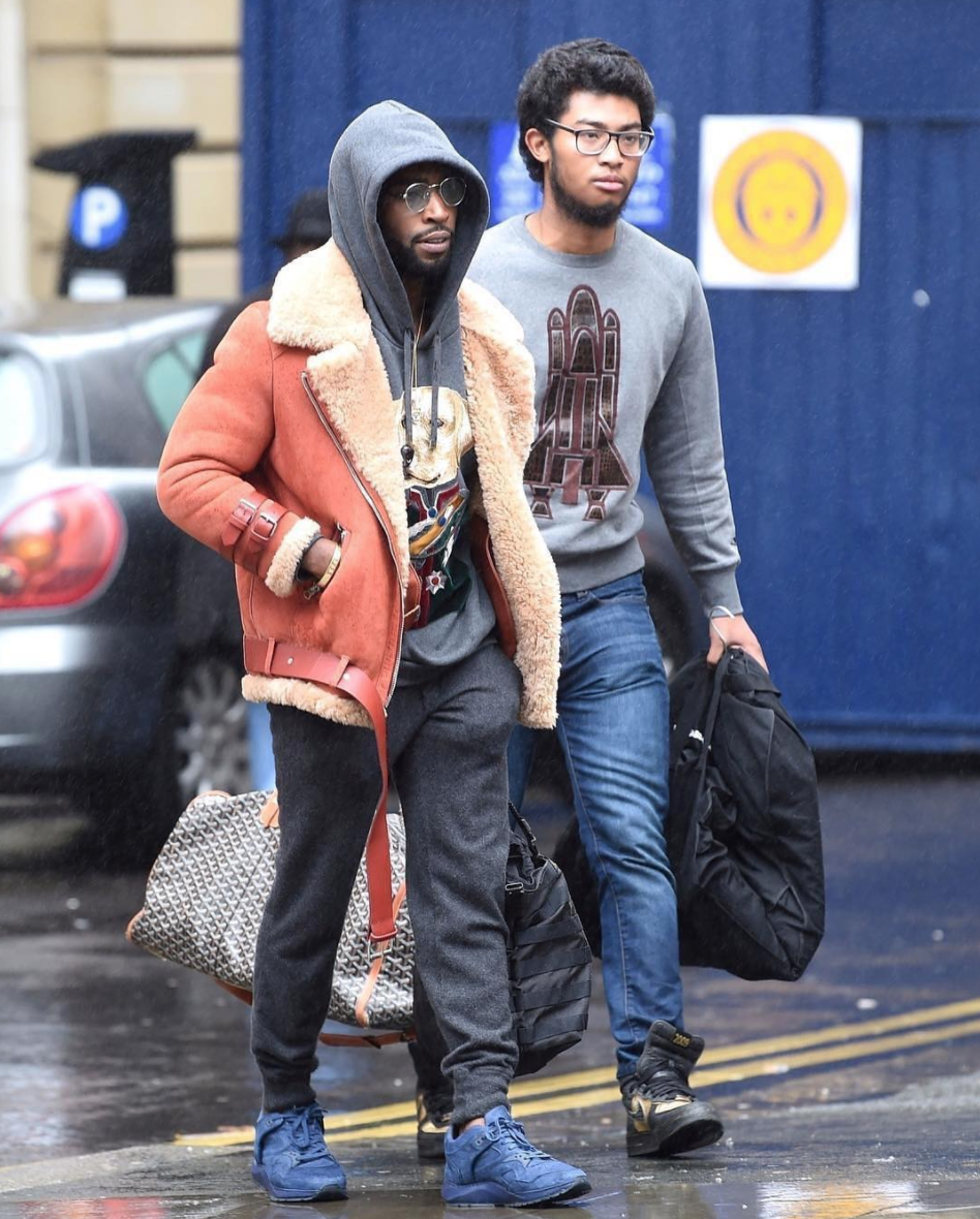 SPOTTED: Tinie Tempah In Acne Studios Shearling Jacket, Dolce & Gabbana Hoodie And Filling Pieces Sneakers