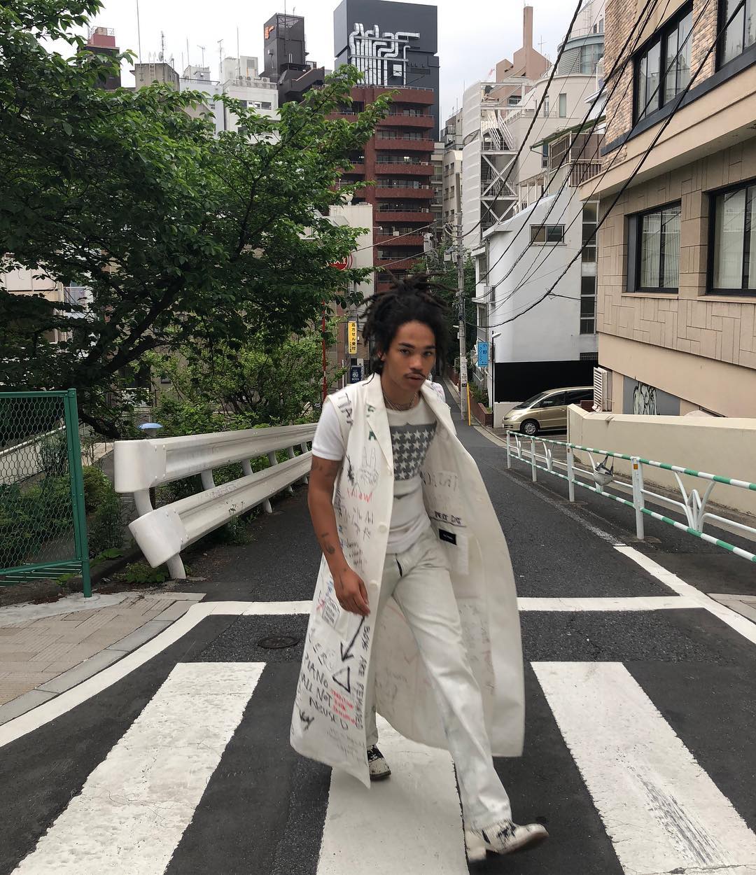 SPOTTED: Luka Sabbat Ties Raf Simons’ Lab Coat into an All-White Fit