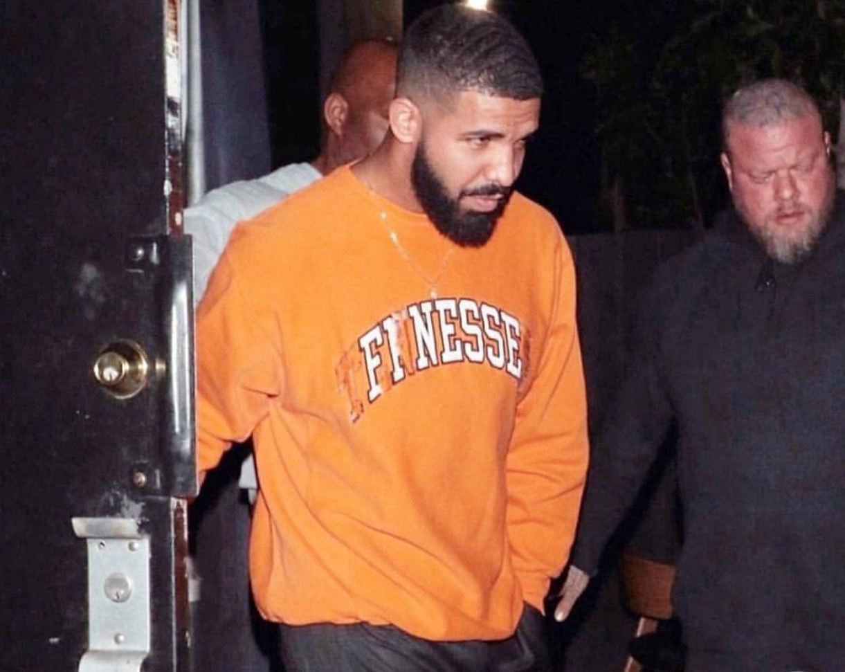 SPOTTED: Drake Parties in Orange “Finesse” Sweatshirt & Black Track Pants