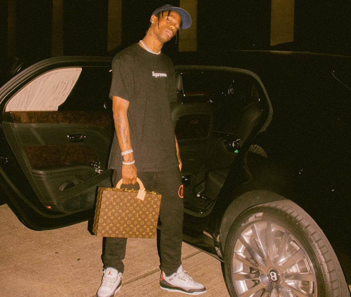 SPOTTED: Travis Scott Carries LV Briefcase while in Supreme & Jordan 3’s