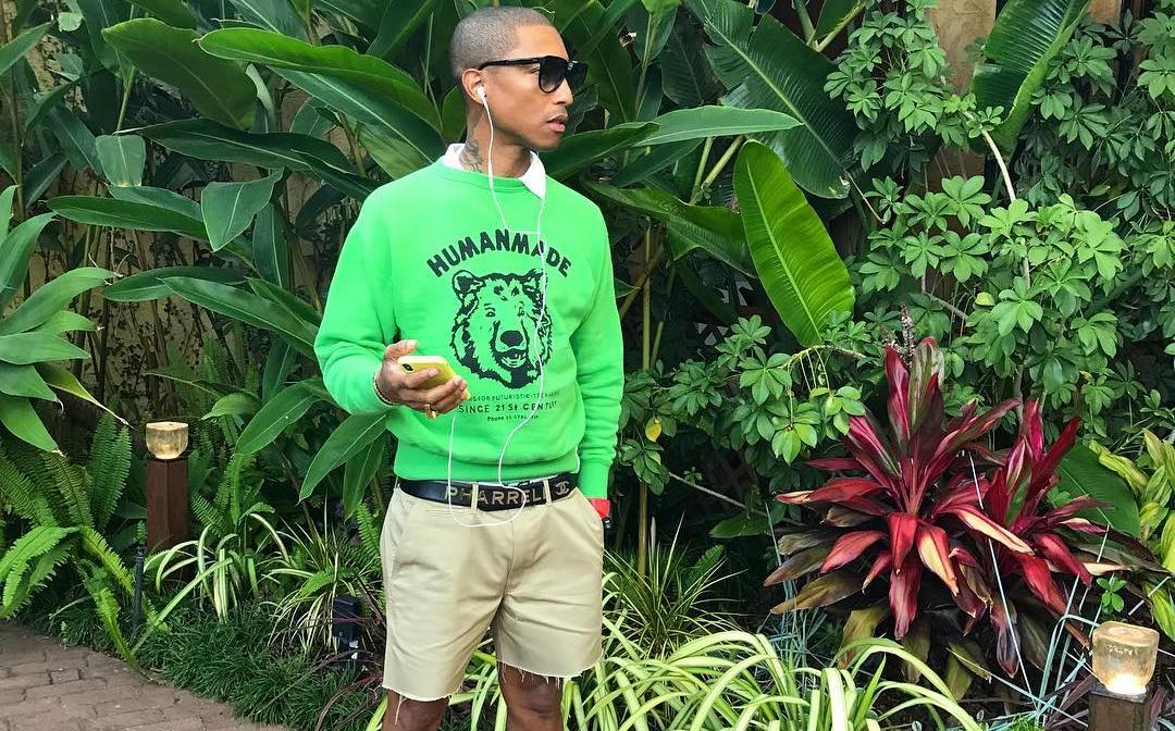 SPOTTED: Pharrell in Green Human Made Sweater & Hu Glide Sneakers