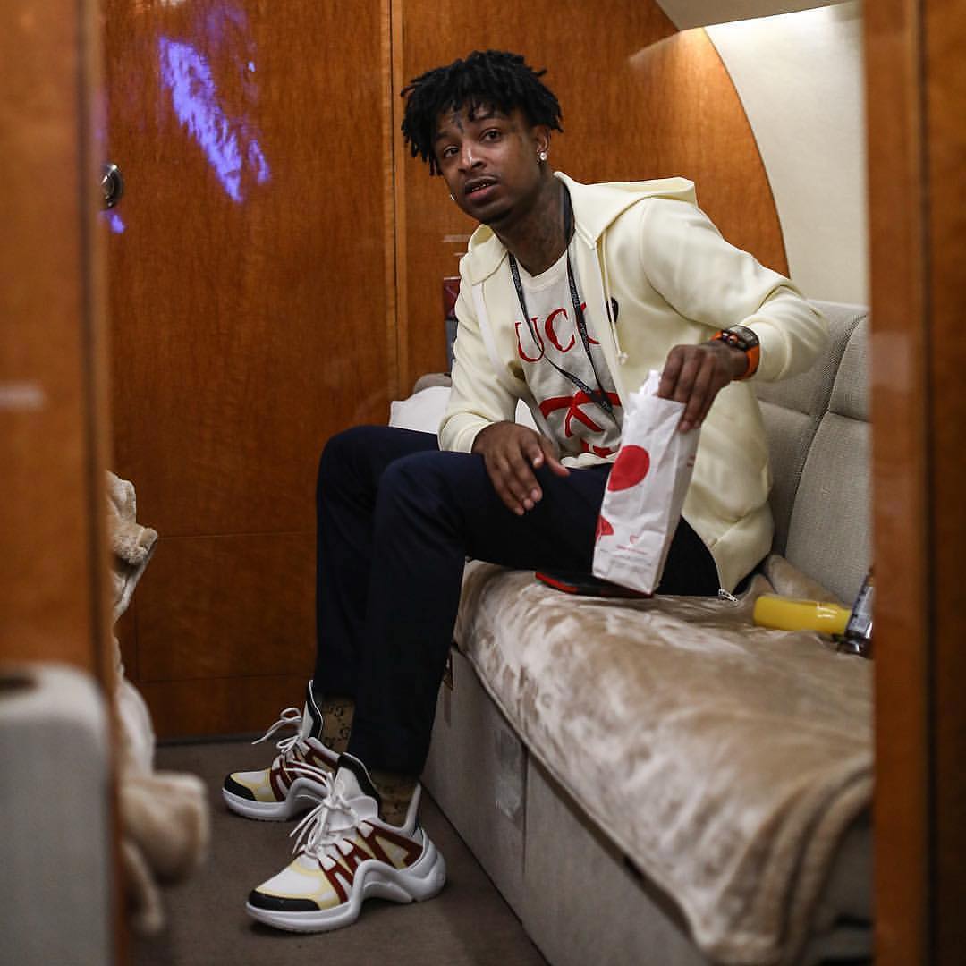 SPOTTED: 21 Savage Sports Gucci and Louis Vuitton on the Go