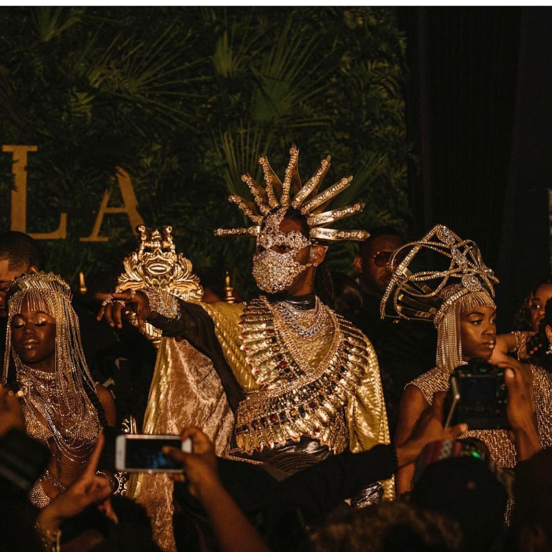 SPOTTED: A Masked Offset Drips in Gold and Diamonds at His Own Birthday Party