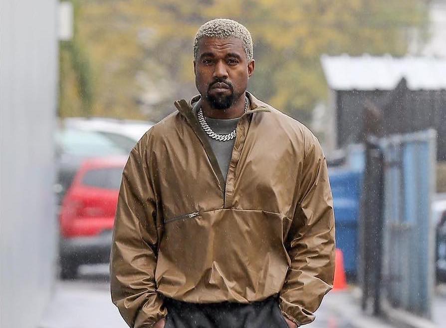 SPOTTED: Kanye West Walks Through the Rain in LA