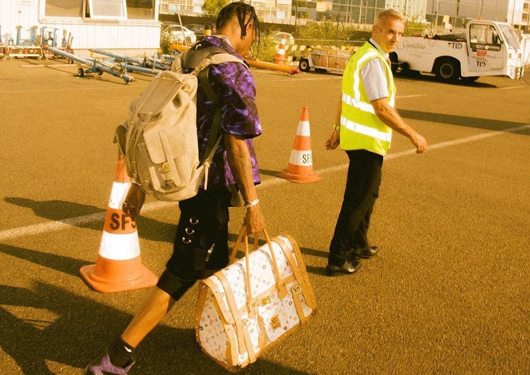 SPOTTED: Travis Scott Dons Louis Vuitton x Takashi Murakami Bag & Ready Made Backpack