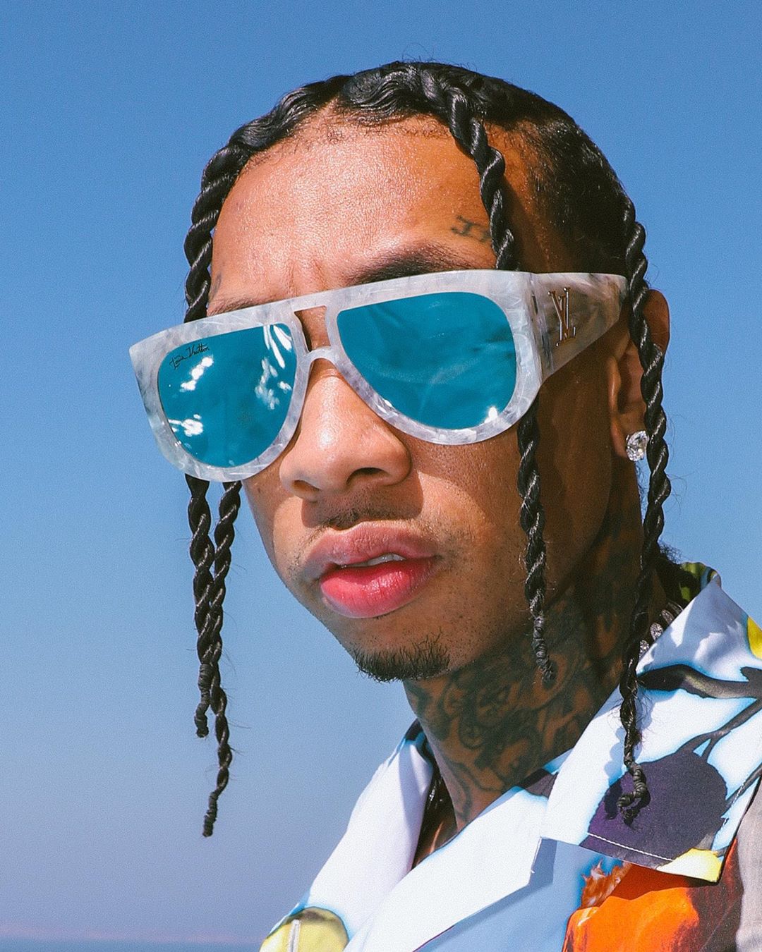 SPOTTED: Tyga Dons Louis Vuitton Sunglasses Poolside in Mykonos – PAUSE  Online