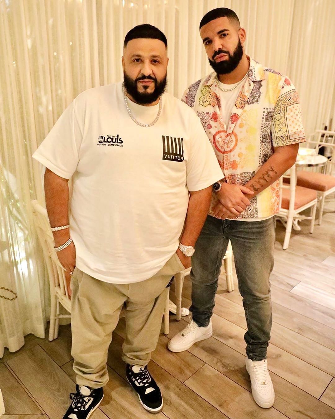 djkhaled sitting courtside with the Louis Vuitton Air Force 1 Low