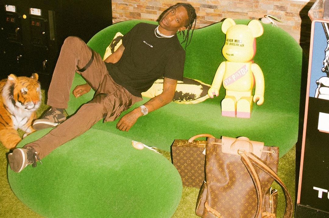 SPOTTED: Travis Scott in Nylon Pants, Nike x Travis Collab AJ1’s & LV Backpack