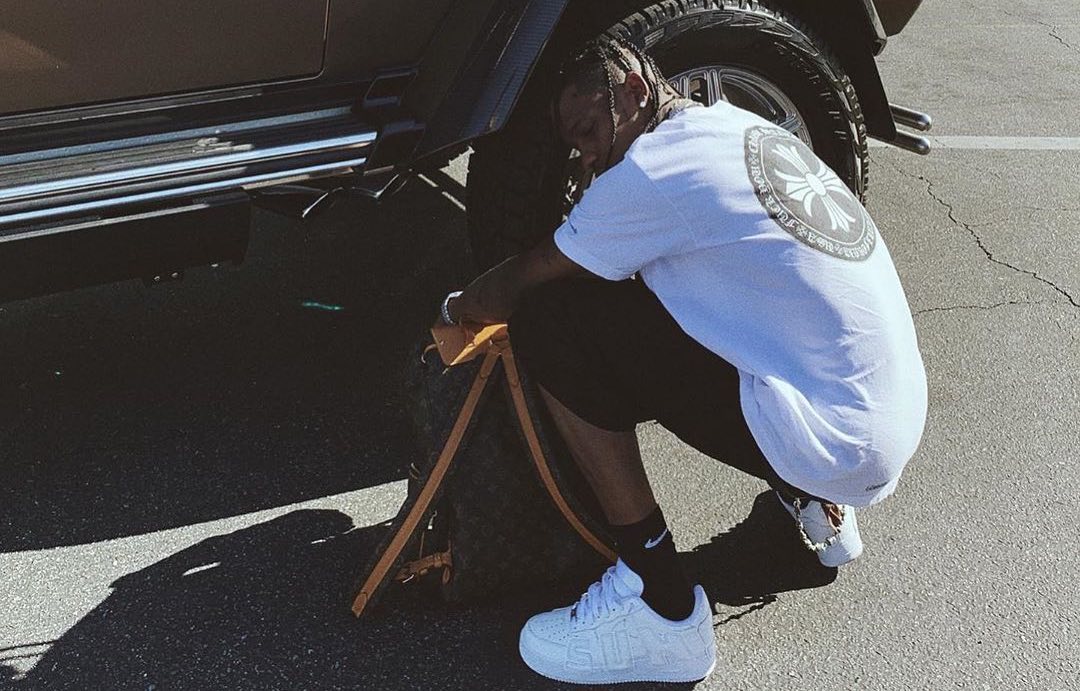 SPOTTED: Travis Scott Shows Off LV Backpack & CPFM x Nike Collab