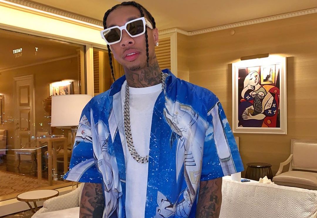 SPOTTED: Tyga Dons Dior Graphic Shirt & Louis Vuitton Millionaire