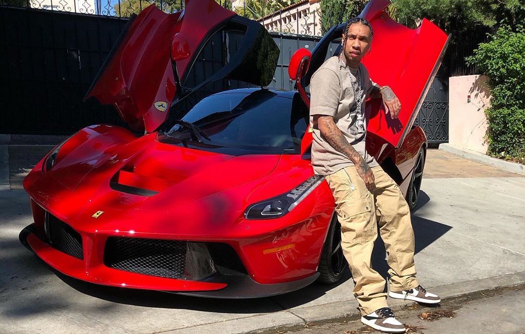 SPOTTED: Tyga Shows Off His Farrari in Travis Scott x Nike AJ1