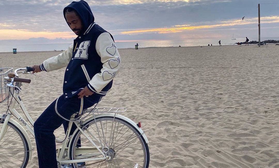 SPOTTED: Big Sean Hits The Beach In HumanMade Leather Jacket & Old Skool Vans