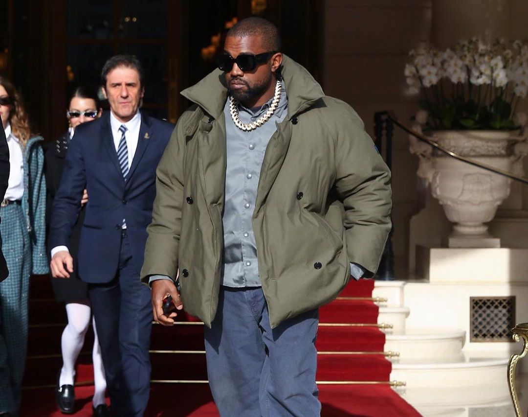 SPOTTED: Kanye West hits Paris in Raf Simons after YEEZY Show