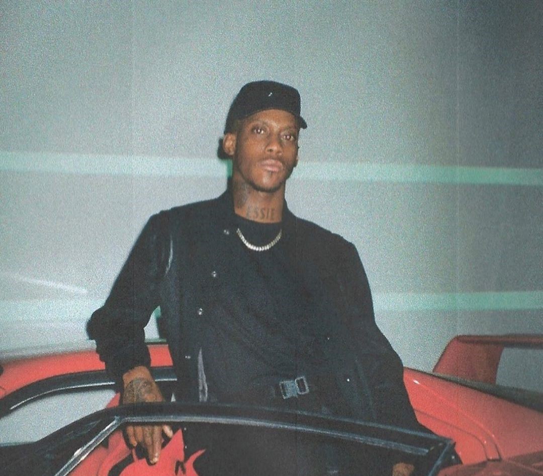 SPOTTED: Octavian Poses In-front of Ferrari in Monochrome Look