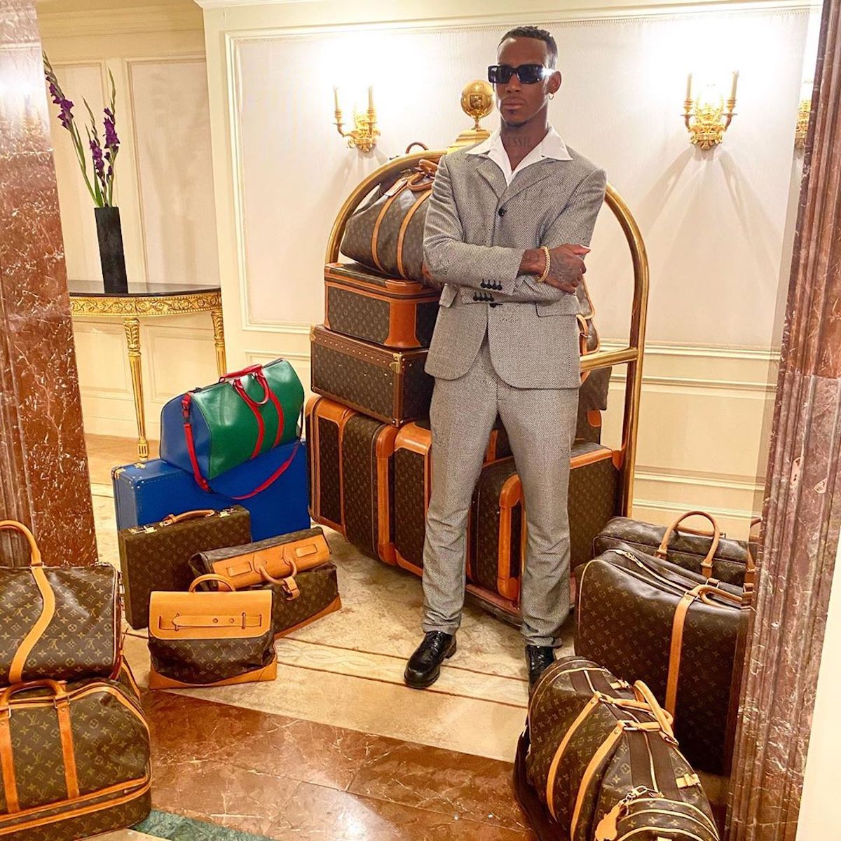 SPOTTED: Octavian Shares Louis Vuitton Luggage Collection