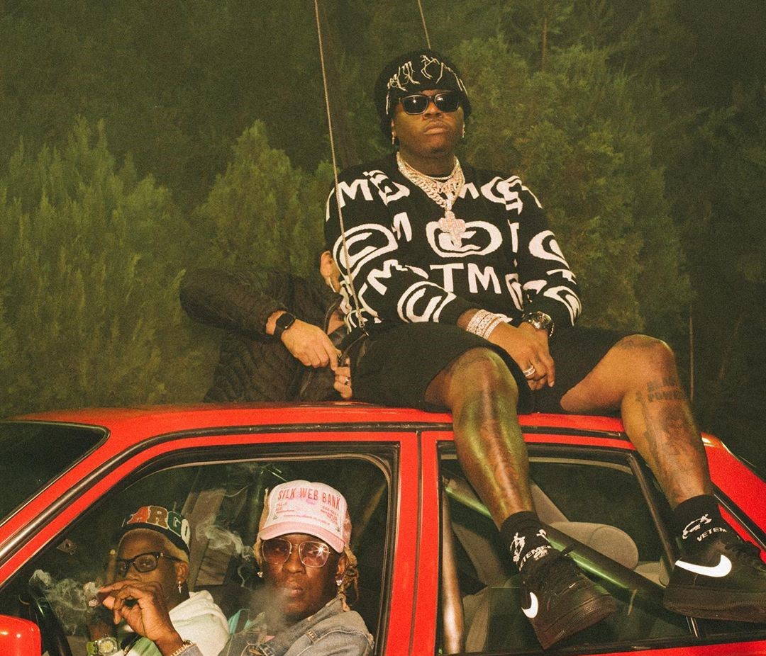 SPOTTED: Gunna Perches on Young Thug and Lil Duke’s Car