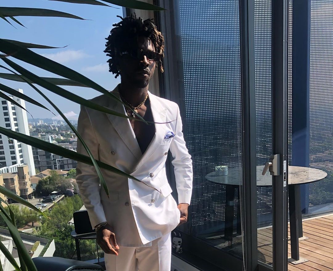 SPOTTED: Saint Jhn Goes Topless Under Double-Breated Suit