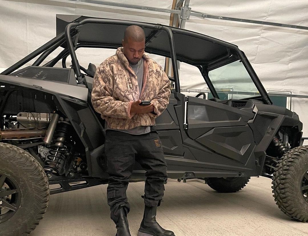 SPOTTED: Kanye Leans against his UTV in Tactical Fit
