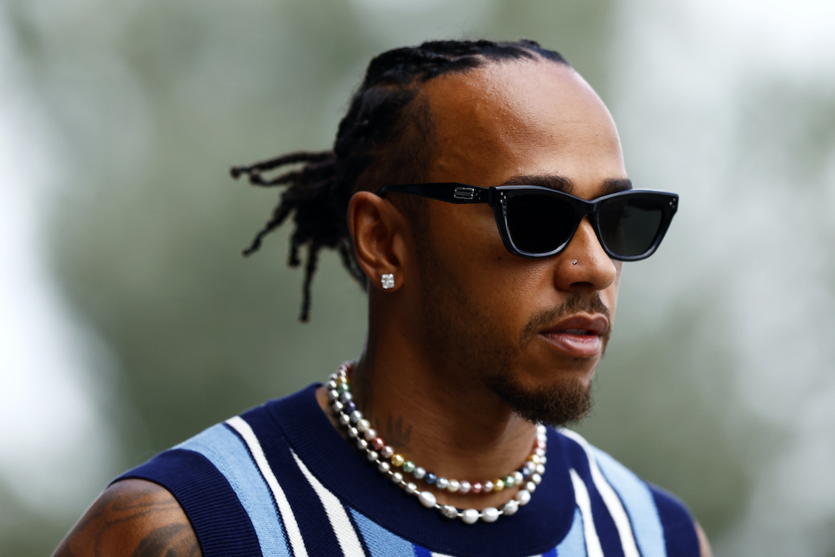 SPOTTED: Lewis Hamilton Glides Through Hungarian Grand Prix Wearing Wales Bonner, Bottega Veneta & more