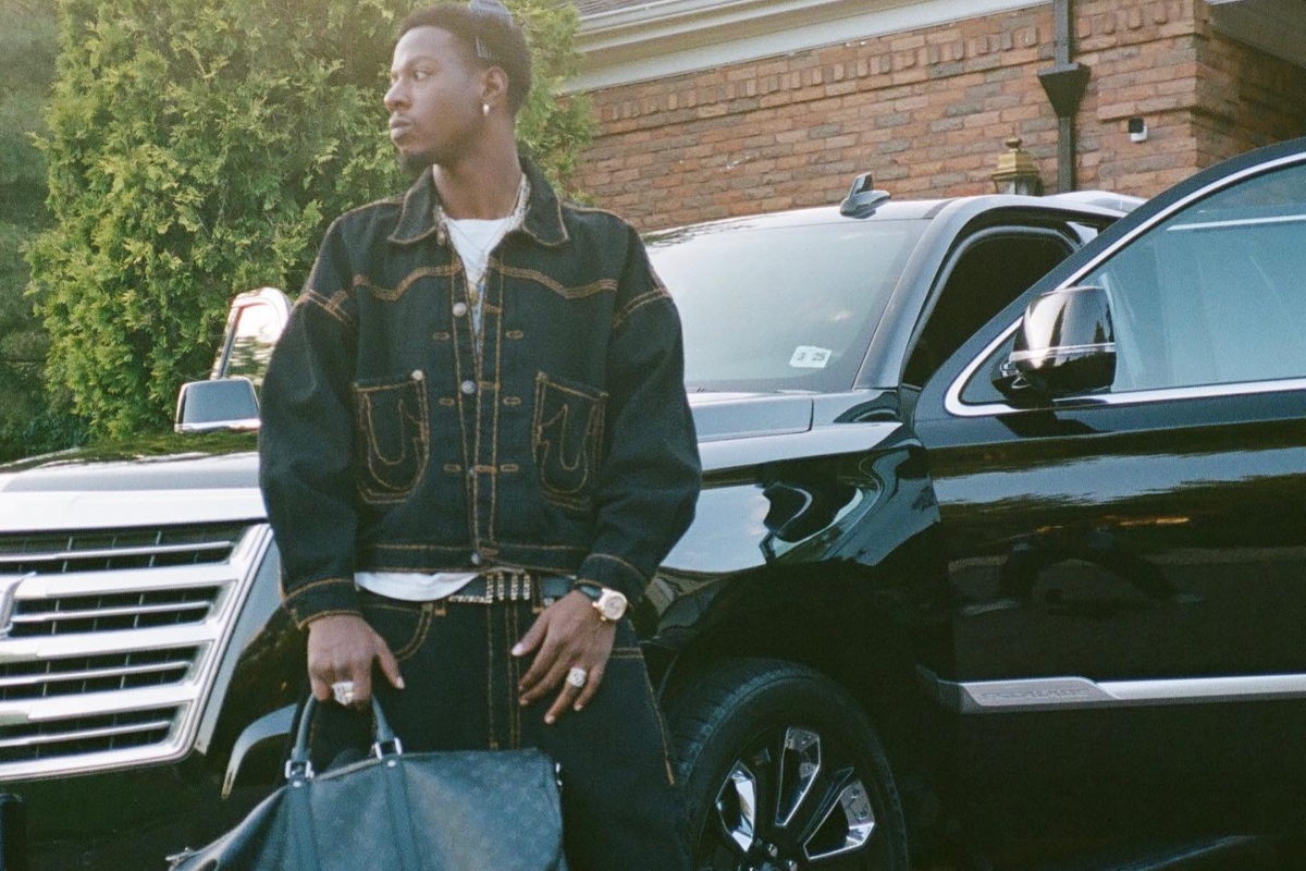SPOTTED: Joey Bada$$ Taps into his New York Roots Wearing Timberland, Louis Vuitton & more
