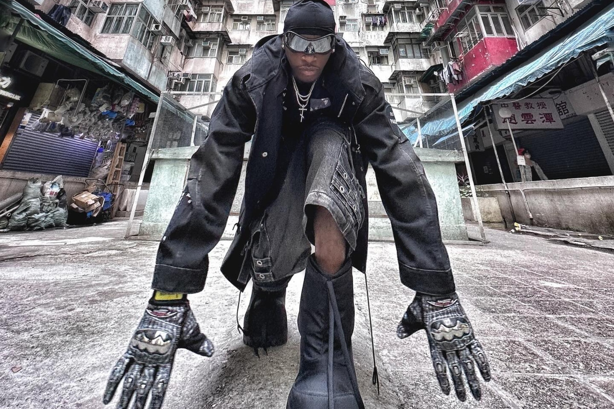 SPOTTED: Bloody Osiris Takes “Harlem 2 Hong Kong” Wearing Balenciaga, Raf Simons & more