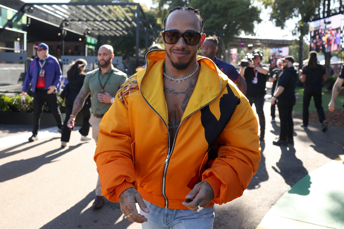 SPOTTED: Lewis Hamilton Returns to the Paddock in Style Wearing Balmain Fall 2024 Collection