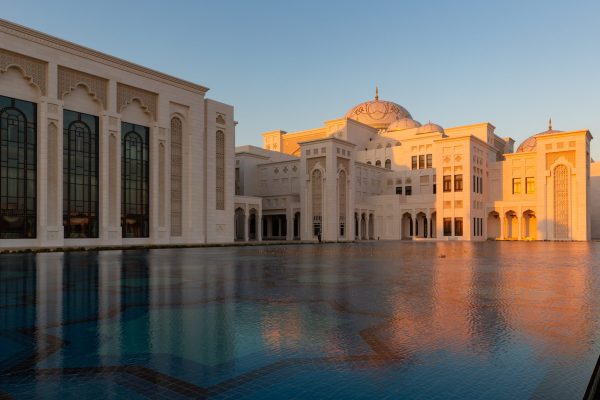 An exterior shot of Qasr Al Watan Palace during sunset.