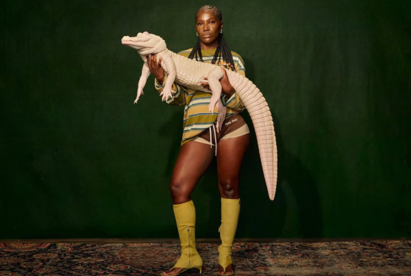 Doechii holds white alligator for the cover of her album 'Alligator Bites Never Heal.'